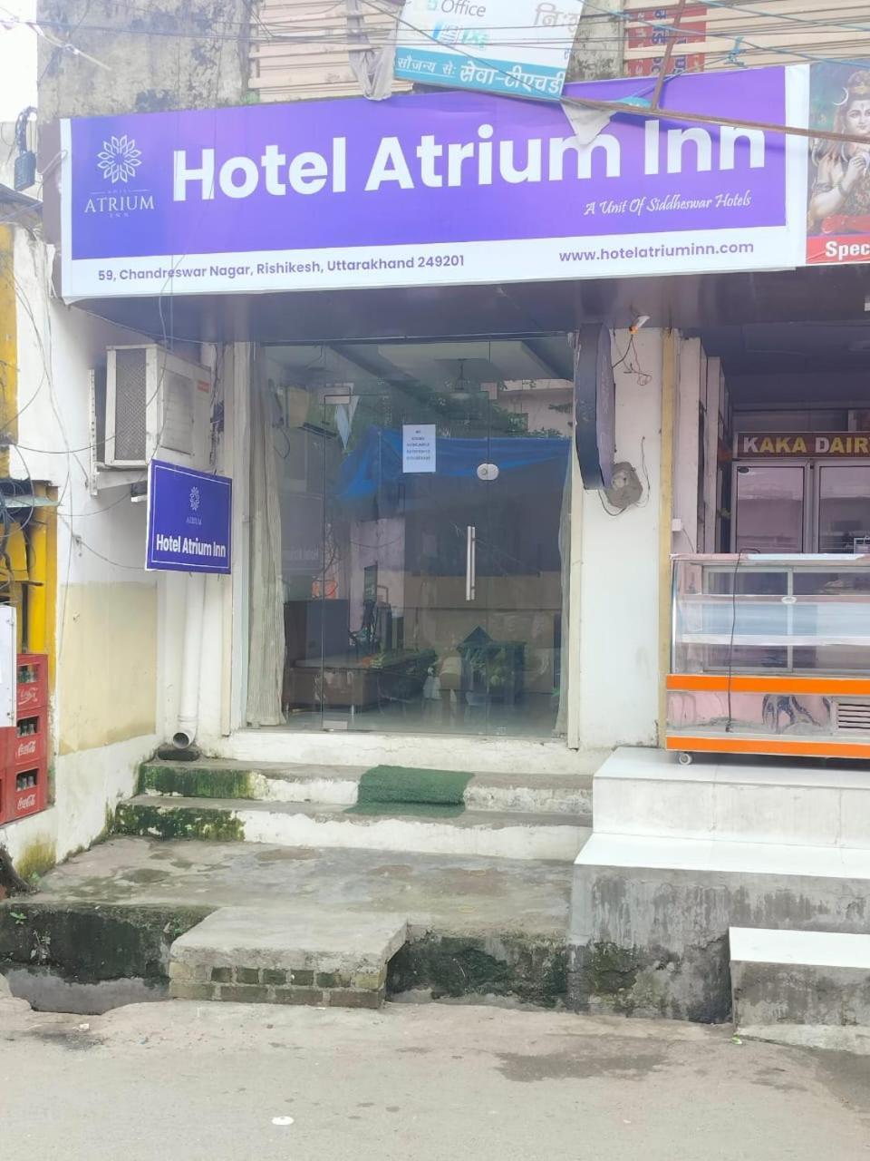 Hotel Atrium Inn Risikés Kültér fotó